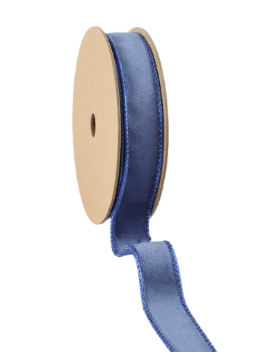 A roll of blue velvet ribbon with a gold-colored spool.