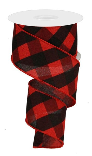 a roll of red and black plaid ribbon
