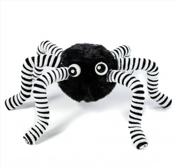 a black and white spider stuffed animal on a white background