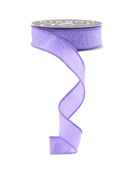 a roll of purple ribbon on a white background