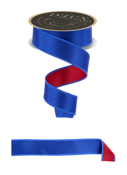 a blue ribbon with a gold medal on top of it