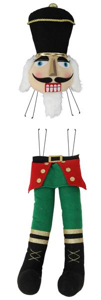 a nutcracker with a hat and green pants