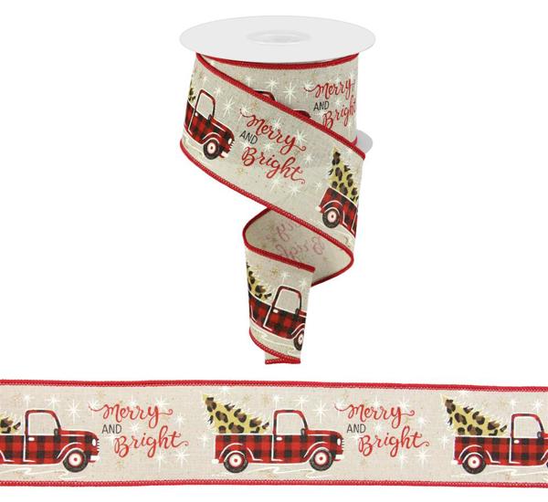a roll of christmas ribbon with a truck on it