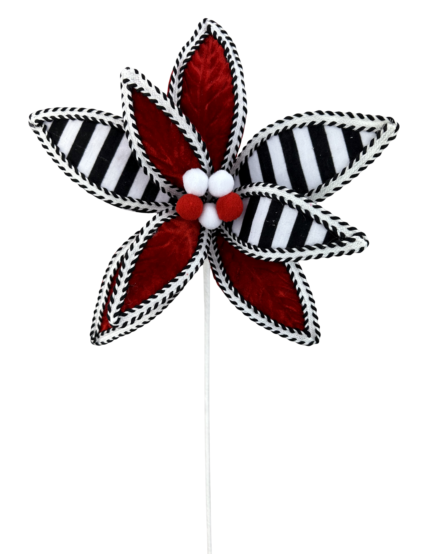 A decorative flower-shaped object with red and black stripes and white pom-poms, standing on a white stick.