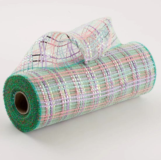 a roll of green and pink plaid fabric