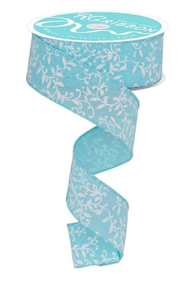 A turquoise and white floral patterned ribbon is shown, with the ribbon winding around itself in a spiral pattern.