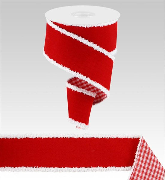 a roll of red and white ribbon on a white background