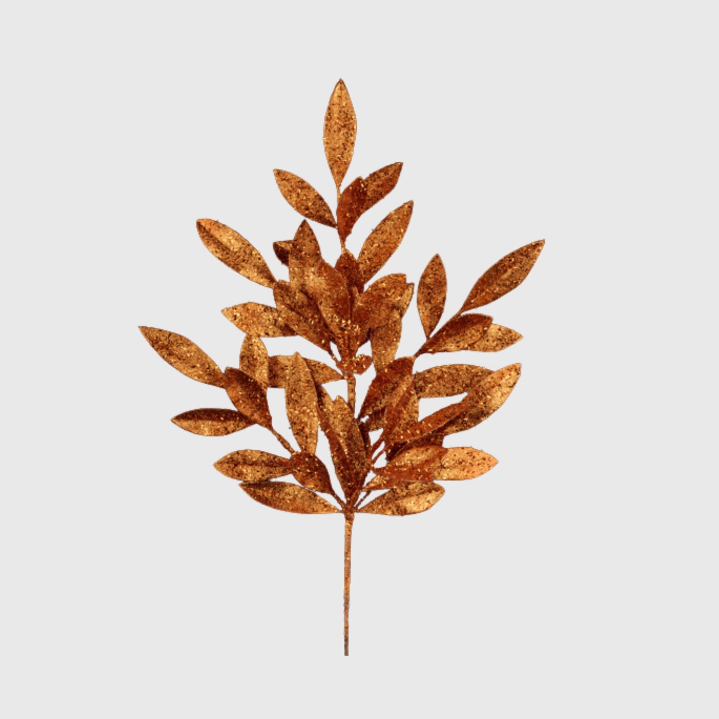 a single golden leaf on a white background