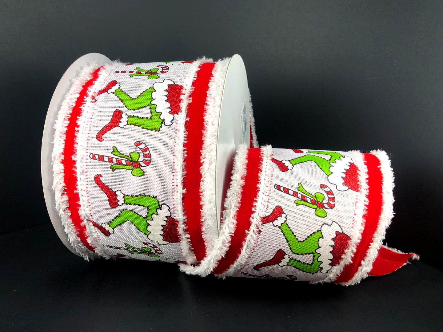 a pair of red and white christmas ribbon