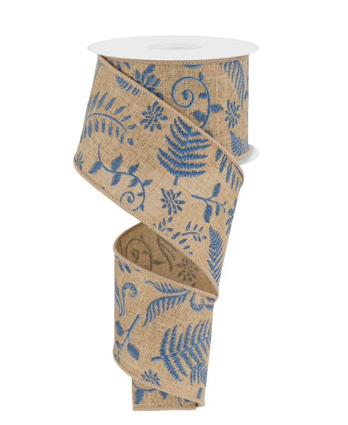 a roll of blue and white patterned ribbon