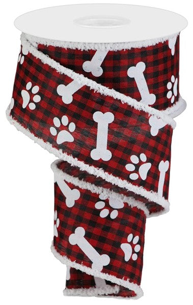 a roll of red and black dog paw and bone ribbon