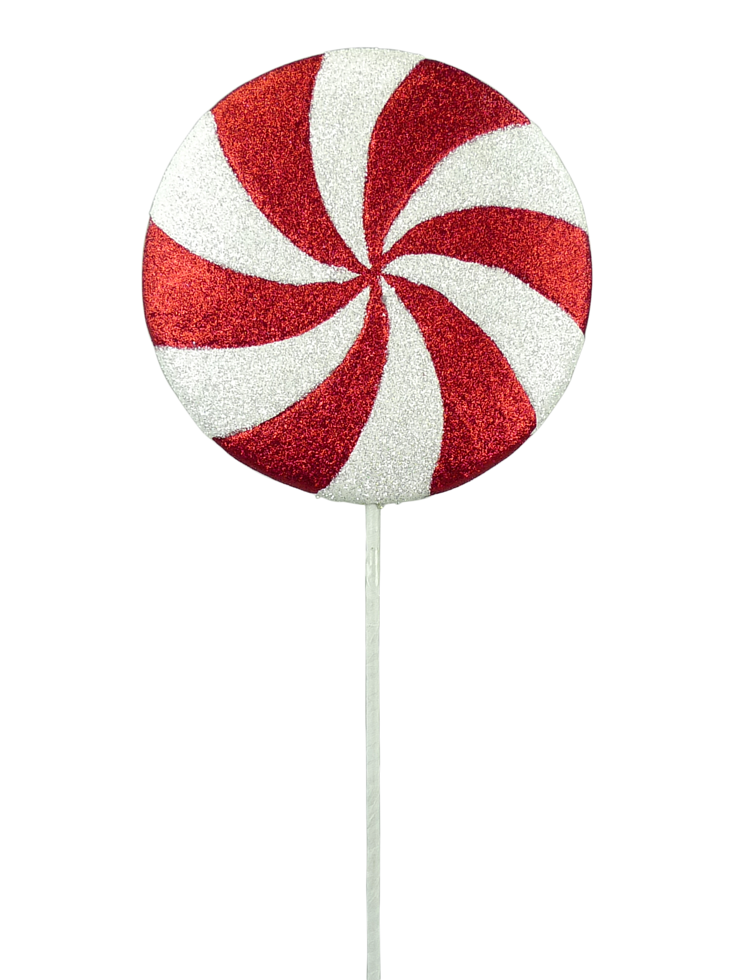 a large, red and white candy-like object with a spiral pattern on it.