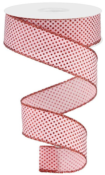 a roll of red polka dot ribbon on a white background