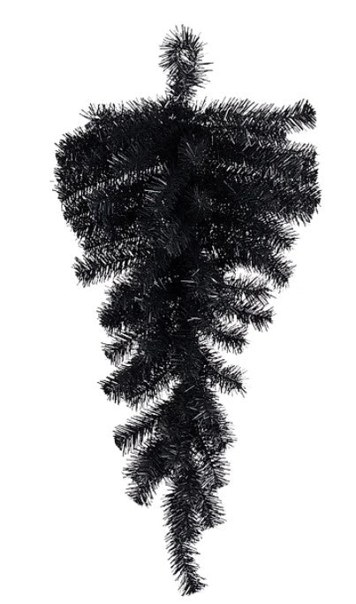 A black Christmas tree with numerous branches and sprigs.