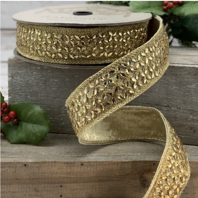 a gold ribbon on a wooden table