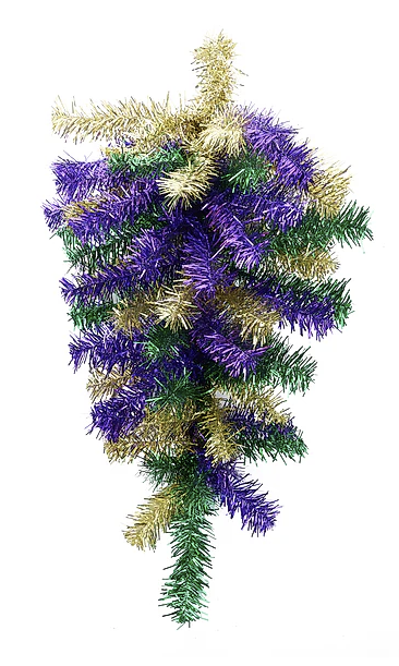 A colorful Christmas tree with gold and purple ornaments, creating a festive and vibrant display.