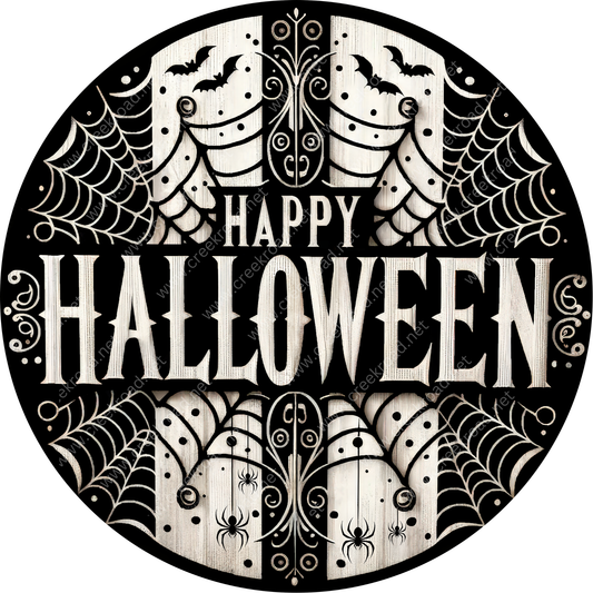 A circular Halloween-themed sign with a black and white design featuring bats, spiderwebs, and the text "HAPPY HALLOWEEN".