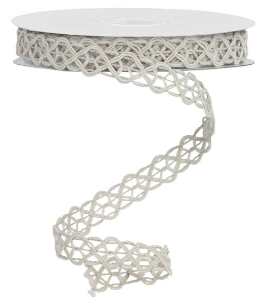 a white table with a white ribbon on top of it