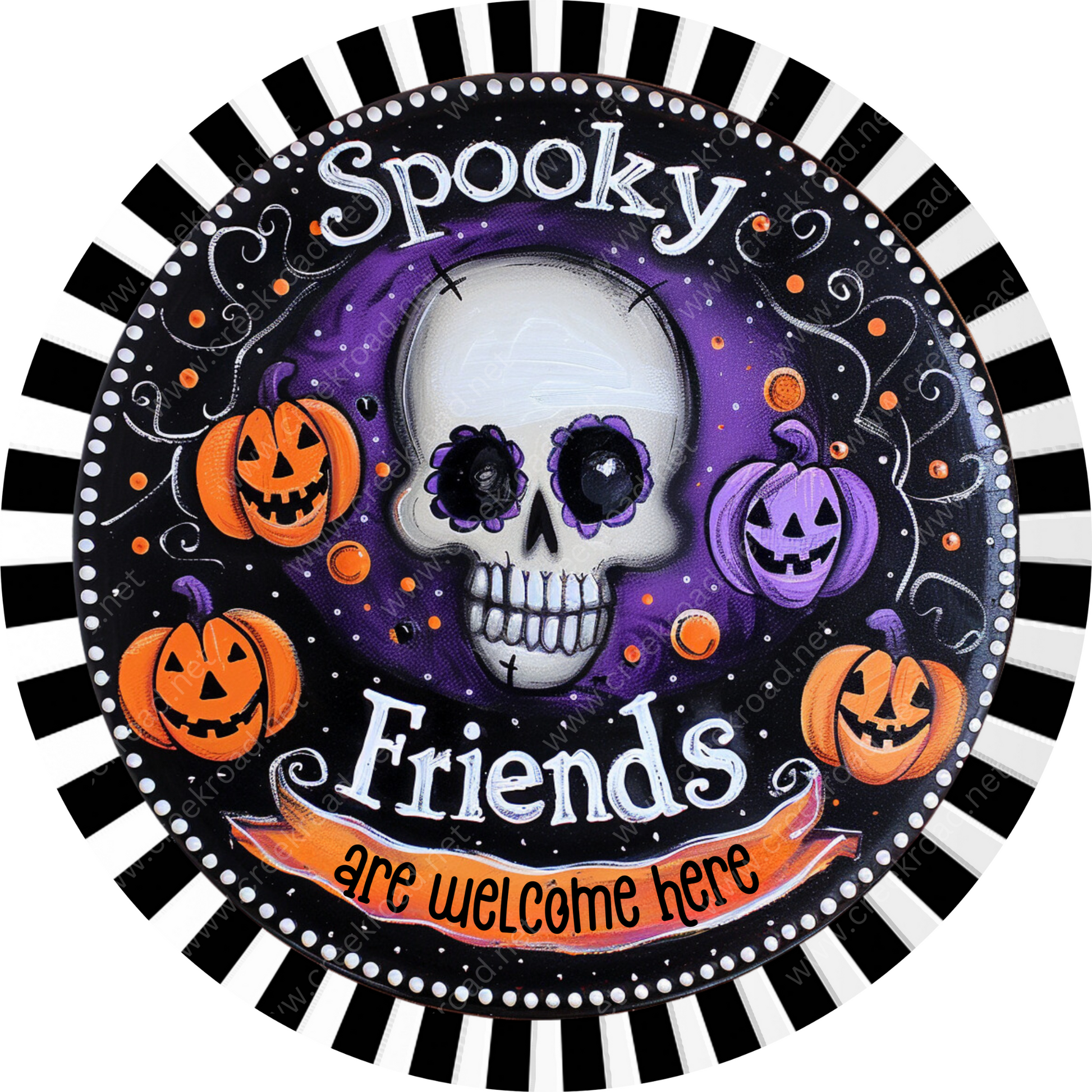 a plate with a skull and pumpkins on it