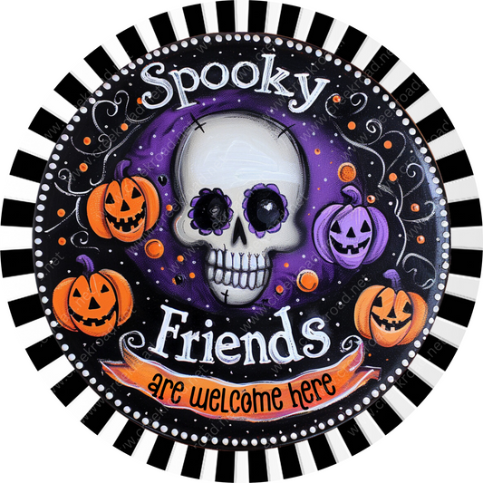 a plate with a skull and pumpkins on it