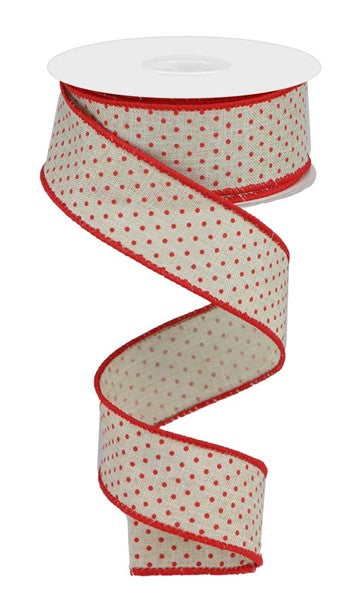 a roll of red and white polka dot ribbon