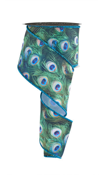 a close up of a tie with peacock feathers on it