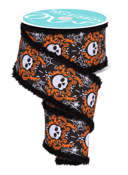 a roll of halloween ribbon with skulls and skulls on it