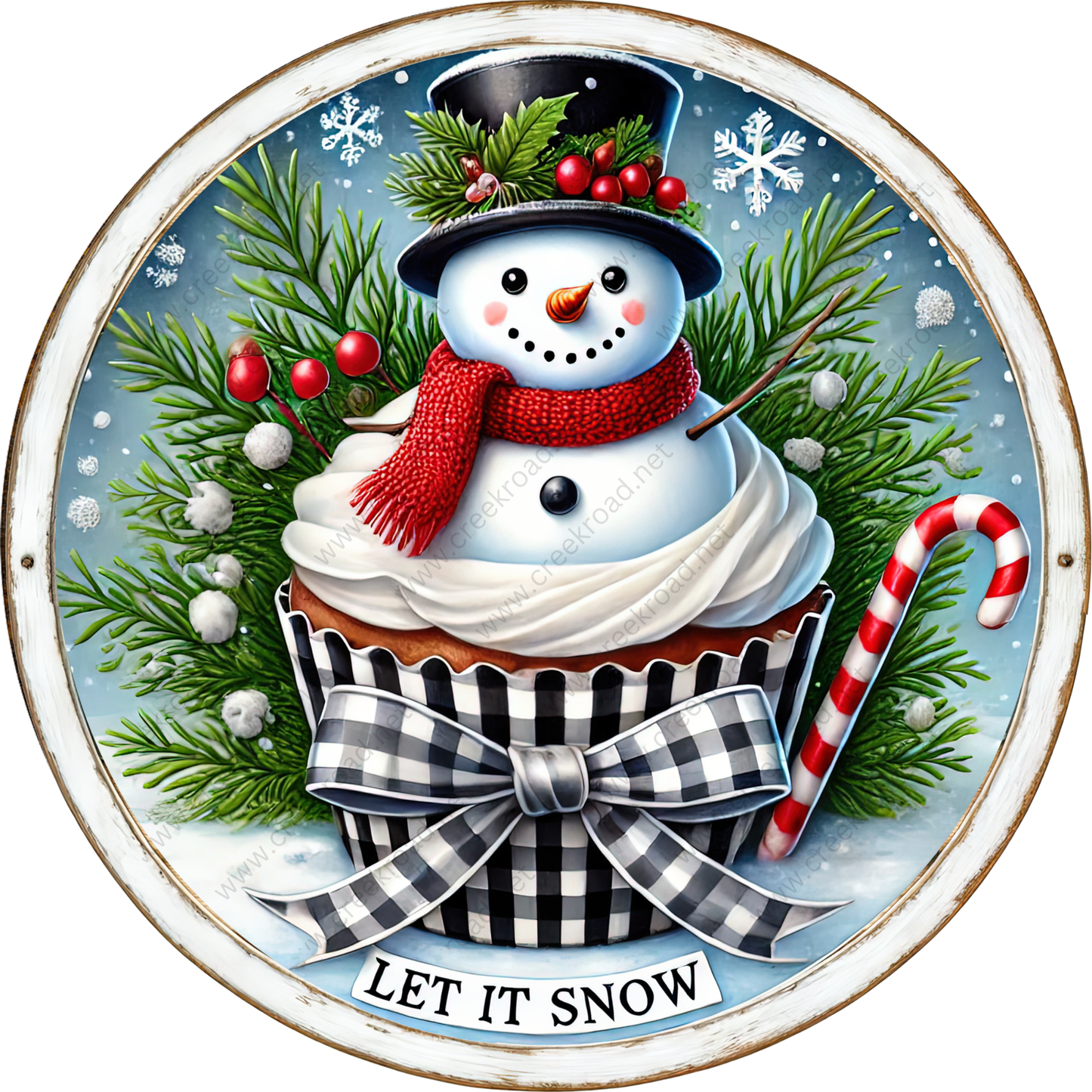A snowman wearing a top hat and scarf sits atop a cupcake, surrounded by pine branches, berries, and a candy cane, with the phrase "Let it snow" displayed below.