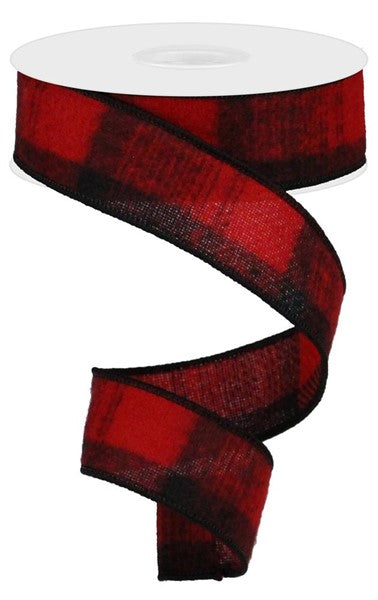 a red and black plaid ribbon on a white background