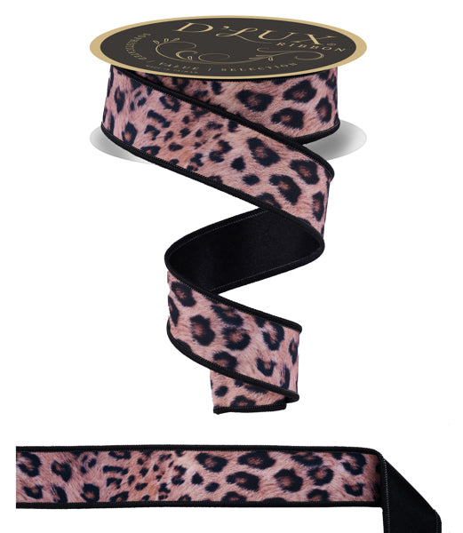 A leopard print ribbon with a black border, and a black and gold label that reads "DELUXE".