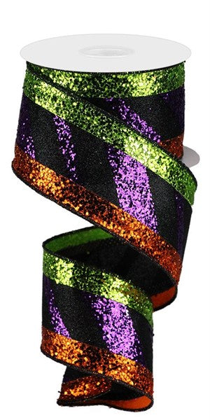 a spool of colorful glitter ribbon on a white background