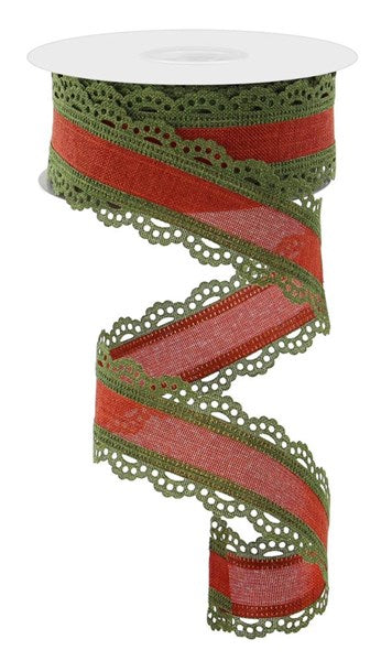 a roll of red and green ribbon on a white background