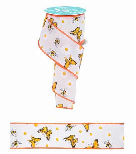 a ribbon with a repeating pattern of yellow and orange butterflies and white daisies.