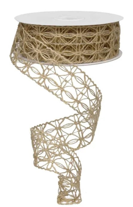 a spiral-shaped beige ribbon with a floral pattern, which is attached to a spool of the same beige ribbon.