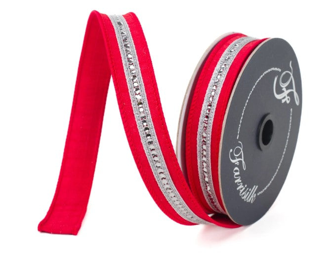 A red ribbon with silver rhinestones is shown against a white background.