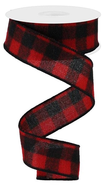 a red and black plaid ribbon on a white background