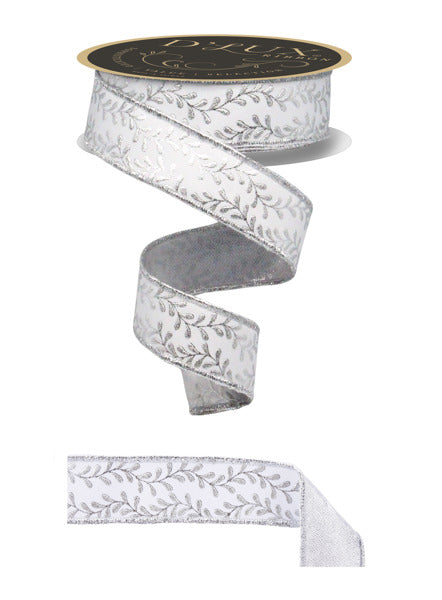 a silver and white floral-patterned ribbon with a gold-colored label.