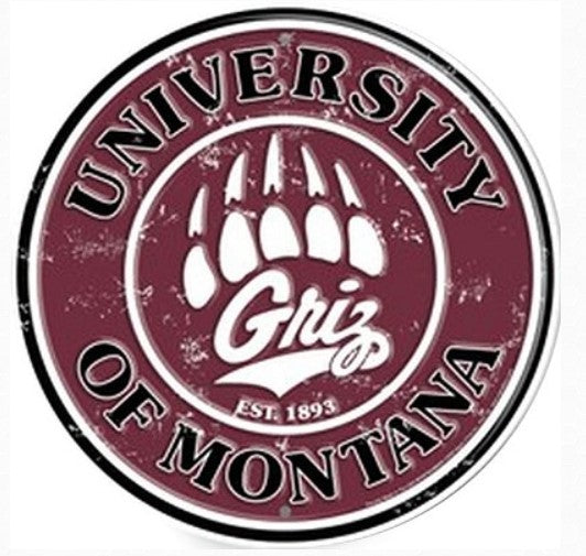 the logo of the University of Montana, which is a circular emblem with a bear paw print and the university's name.