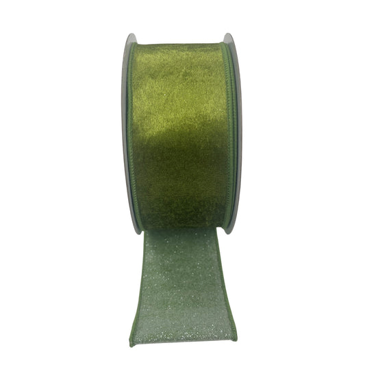 A roll of green glittery ribbon against a white background.