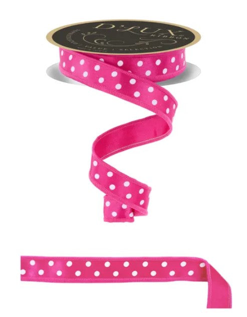 a pink ribbon with white polka dots.