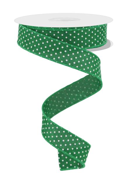 a green and white polka dot ribbon on a white background