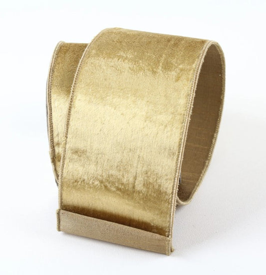 A gold-colored, rolled-up ribbon is shown against a white background.