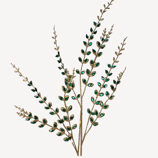 A stylized image of a plant with green leaves and small, round, green gemstones or stones attached to the branches.