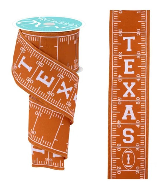 a Texas-themed ribbon with a football design and the word "TEXAS" printed on it.