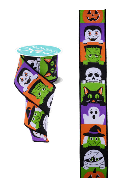 a pair of halloween socks and a spool of toothpaste
