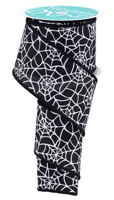 a black and white spider web pattern on a ribbon.