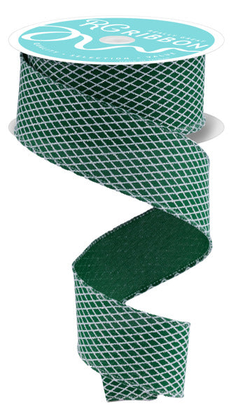 A roll of green and white patterned ribbon with a white label on top.