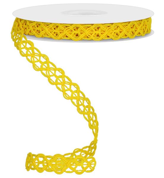 a spool of yellow ribbon on a white background