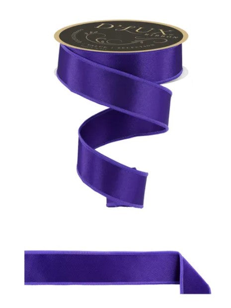 a purple ribbon with a gold label, and there is a smaller purple ribbon below it.