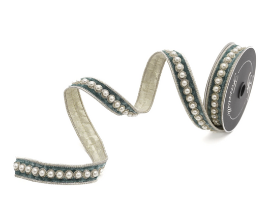 A decorative ribbon with a beige and blue pattern, adorned with small white pearls.